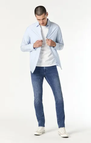 JAKE SLIM LEG IN MID FEATHER BLUE