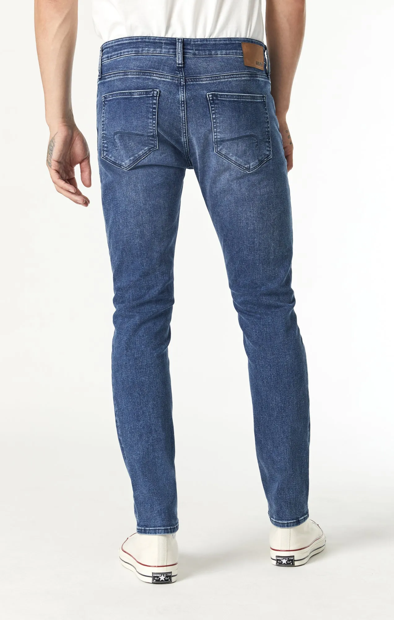 JAKE SLIM LEG IN MID FEATHER BLUE